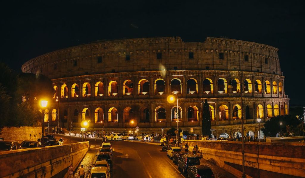 Cars Parked in Front of Rome Colosseum.