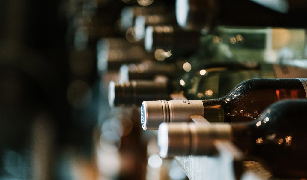 Different bottles of wine are served in the restaurant during The annual Alba White Truffle Fair in Alaba.