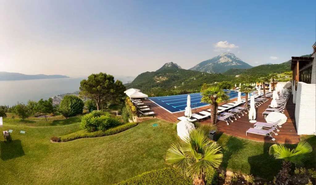 A luxury resort with an infinity pool and beautiful view of the lake and mountains located in Lefay Resorts, Lake Garda.