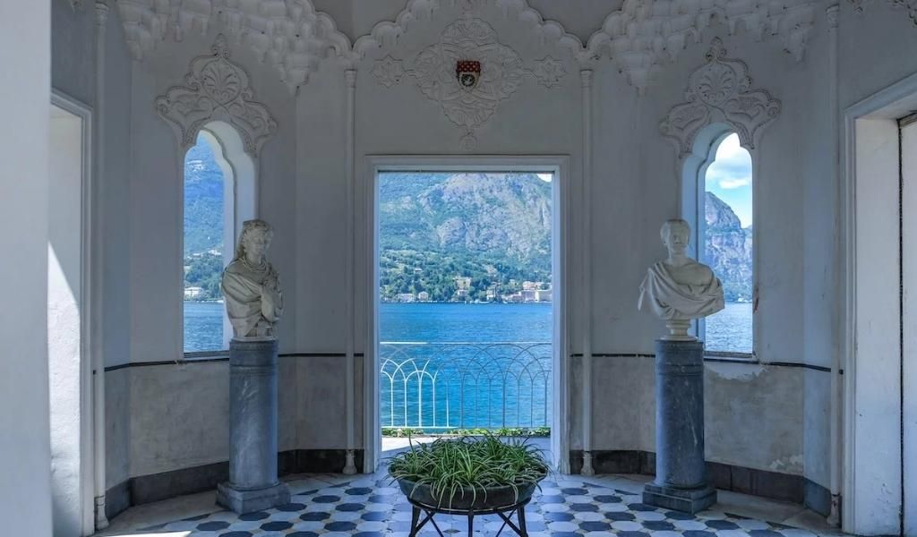 A room with a white statue near Lake Como in View of Lake Como in Villa Melzi D'Eril.