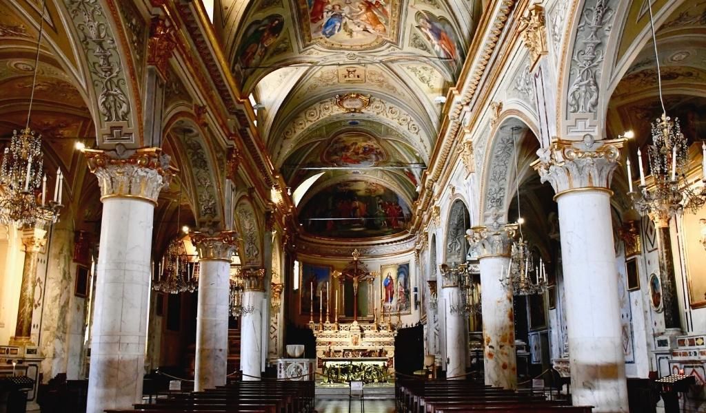 Inside view of the Chiesa di San Martino with painting on the ceiling.