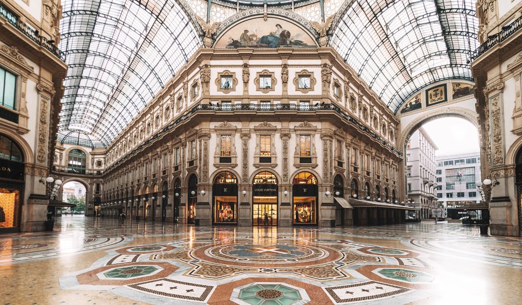 The Galleria di Vittorio Emanuele is located in Milan and is one of the best places to do luxury shopping in Italai