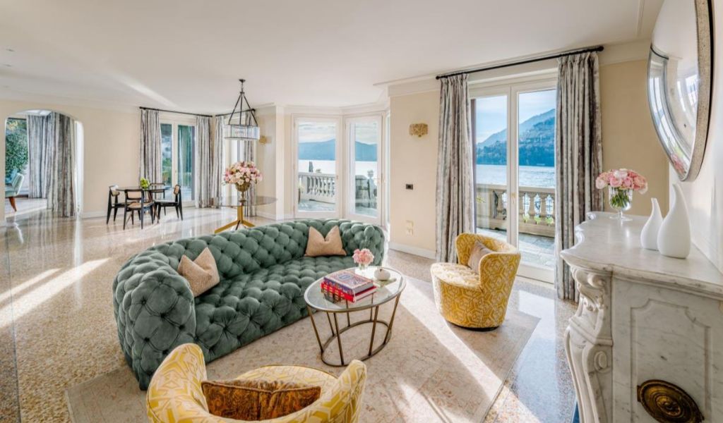 Beautiful living room with view of Lake Como from terrace on the Villa del Lago