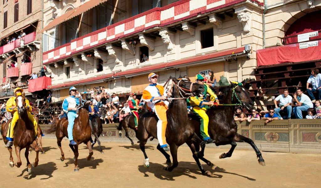 The famous horse race called the Palio di Siena held twice each year in Siena, Italy