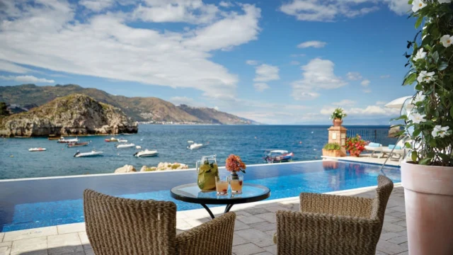✨ Discover Taormina: where the azure waves kiss the sun-soaked shores of your private beach. Indulge in exquisite Sicilian cuisine that dances on your palate, all while embracing the vibrant spirit of this enchanting town. 🌊🍋 Book your luxurious escape to Sicily and elevate your summer! ☀️ #SicilyDreams #TaorminaLuxury #VisitTaormina #SicilianEscape #TaorminaTravel #SicilyAdventures #LuxuryTravel